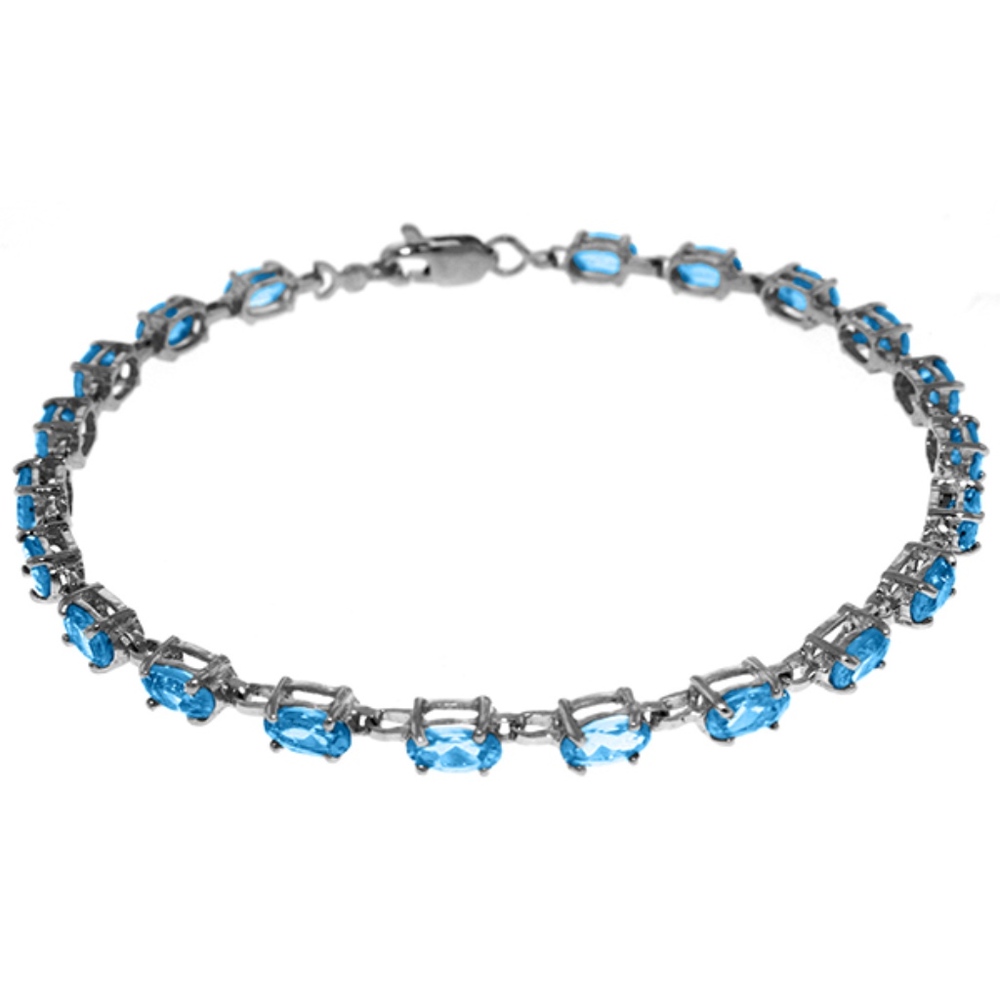 14K. SOLID GOLD TENNIS BRACELET WITH BLUE TOPAZ - Picture 1 of 2